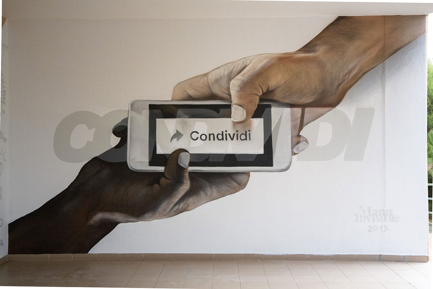 ''Condividi'' Spray and quartz paint on wall 3 x 4,5 m Senorbì 2019