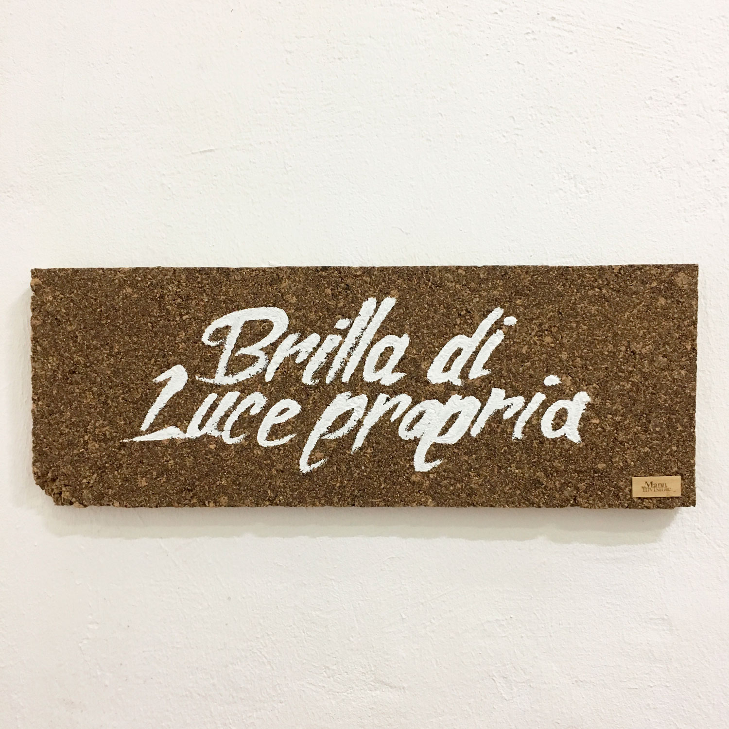 “Brilla di Luce propria” Lime on cork 25 x 70 x 4 cm 2017